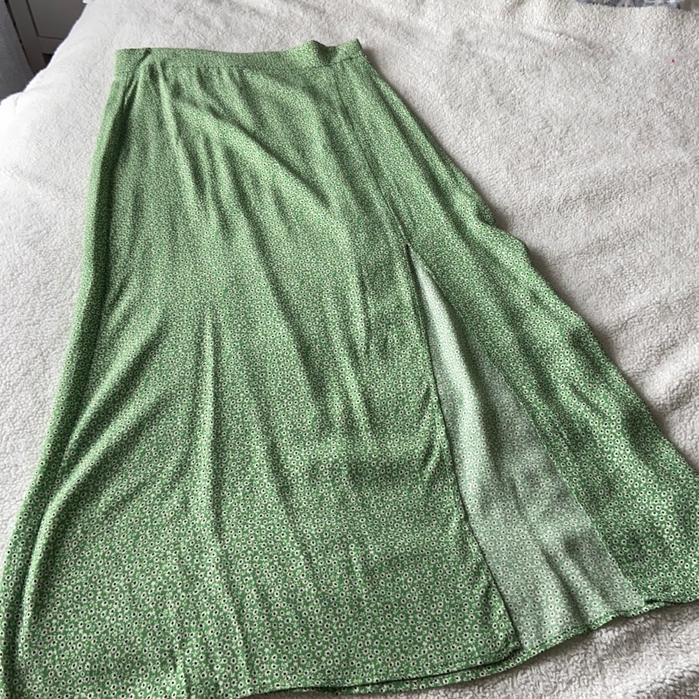 H&M skirt with slit. So flattering. Size 4